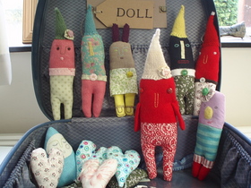 handmade-dolls-in-suitcase-by-cathy-cullis.jpg