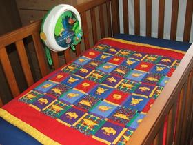handmade-quilt-in-baby-crib-by-abstract-splotcHes.jpg