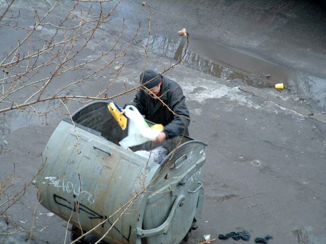 man-going-through-garbage-by-little-lushie.jpg