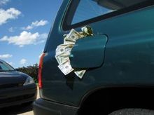 putting-money-in-the-gas-tank-by-mikecco.jpg