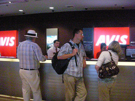 rental-car-ticket-window-by-old-shoe-woman.jpg