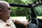 Jim driving -- a frequent activity of his.